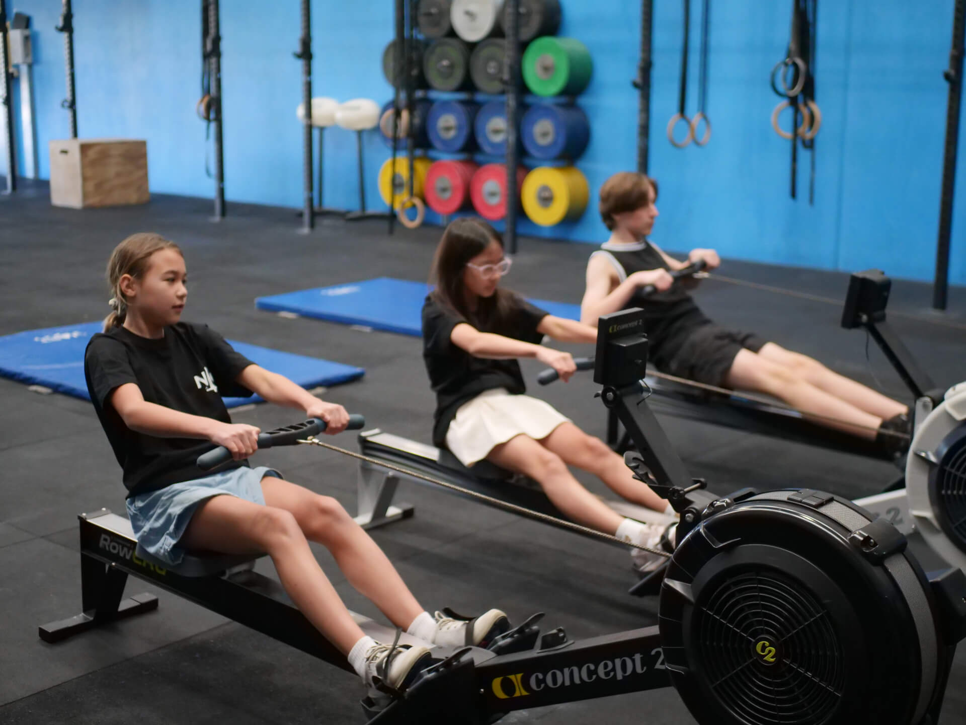 Kids rowing side by side at Niche CrossFit